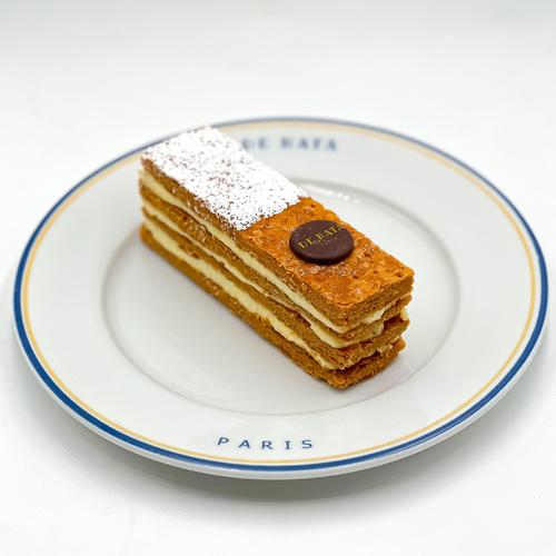 Mille feuille - three layers of mille feuille biscuits in stuffed with a rich vanilla cream