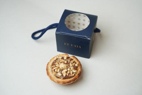 NATA HAZELNUT - NATA TOPPED WITH HAZELNUT SAUCE AND NUTS