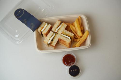 VEGGIE TOSTINI - A great start with an appetizer consisting of a slice of
  crunchy white toast bread filled with a variety of vegetables Eggplant,
  zucchini, red, yellow, and green capsicum, onion, Pesto, basil leaves with
  Parmesan cheese, mayonnaise, Served with French fried and ketchup.