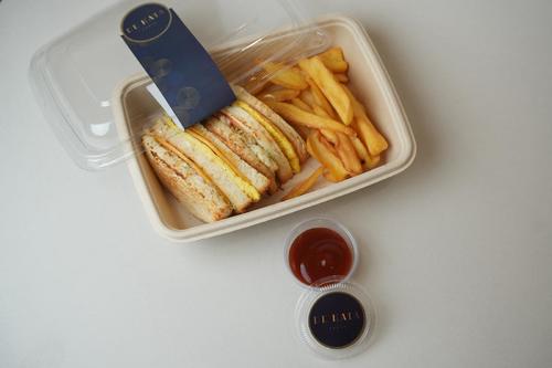 DE CLUB SANDWICH - A gourmets Club sandwich with unique twist and layers of
  delicious fillings, with white toast slice, poached chicken, cucumber
  pickles, mayonnaise, omelet, and cheddar cheese, Served with French fried and
  ketchup.