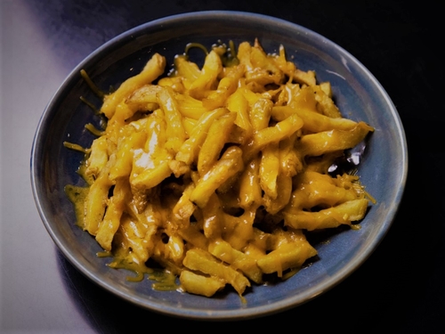 Cheese Fries - Freshly Cut Deep Fried Potato Topped With Melted Chedder Cheese.