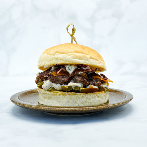 Savor - Burger 32 - Beef Patty,chedder cheese,bacon,jalapeno,lemon aioli sauce served with freshly home made  bun