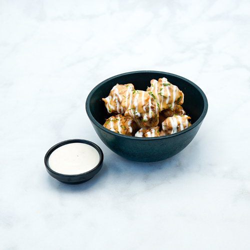 CHICKEN POPCORN - Cornfried chicken, coated with honey rooster mayo serve with ranch