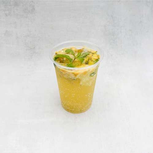 Passion fruit mojito - Refreshing blend of fresh passion fruit , lemon and mint garnished with basil seeds