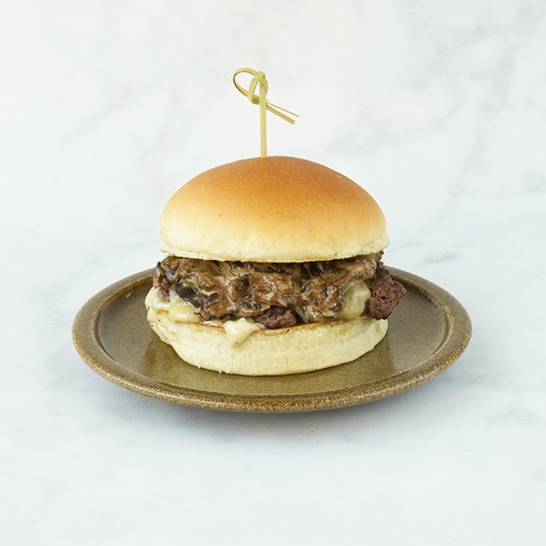 Mushroom Swiss - Beef patty ,Swiss cheese ,aioli &home made mushroom sauce served in freshly home made bun