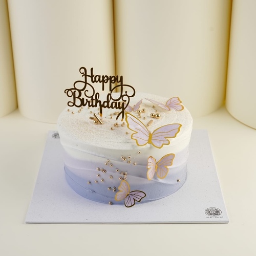 9 inch purple&white occasion cake