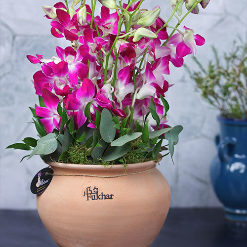 Round Fukhar 2 - Round fukhar with orchids Hight : 50 cm Width : 20 cm 
 ** Disclaimer: The colors of the flowers may vary depending on availability