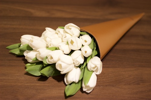 Brown leather bouquet, white tulip