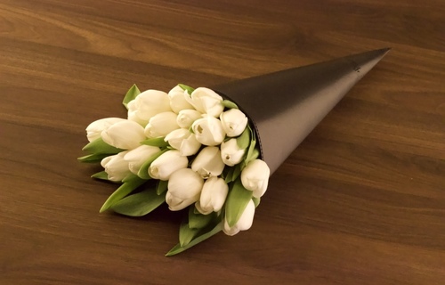 Black leather bouquet, white tulip