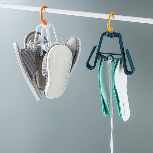 Shoes hanger - The shoe rack is a foldable design, which can hang two pairs of shoes at the same time and is convenient to put away when not in use. 
The drying rack has four multifunctional clips, which can dry socks, insoles and shoelaces. 
The shoe rack has a 360° rotating hook design, which is wind-proof and more convenient. 
The hook rack is easy to hang on the closet, shower pole, laundry room, clothes line, etc. 
The multifunctional rotating rack is available in a variety of colors, which is not only functional and practical, but also brings color to your home. 



Material: ABS+PP. 
Color: white, green, blue. 
Size: 19.3x19.3x24cm.