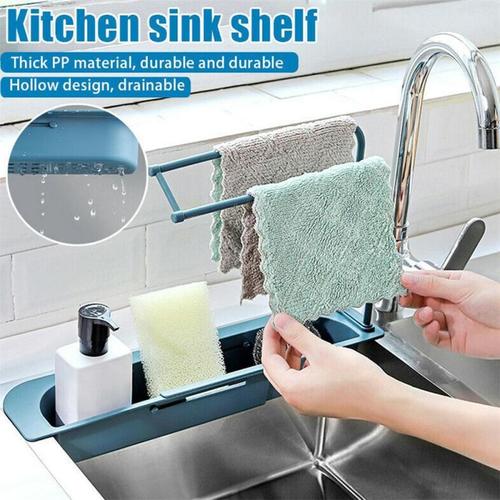 2 in 1 Sink Organizer - Telescopic sink shelf  New large-scale design: it can meet different needs, adapt to different basin sizes, adjust the length freely, and can be a large storage capacity.   PERFECT KITCHEN TOOL: Open and hollow design allows water to drain quickly, perfect for kitchen storage organizer of sponges, brushes, dish rags and kitchen utensils.  The sink stand will keep your utensils away from the dirty water in the pool and prevent bacteria growth.   2-IN-1TOWEL BAR: Daily design, can keep the fabric dry, breathable, clean and hygienic 
  Customize:   Material: PP   Weight: about 260 grams   Product size: 39.5 * 27 * 8.5cm / 15.6 * 10.6 * 3.3in