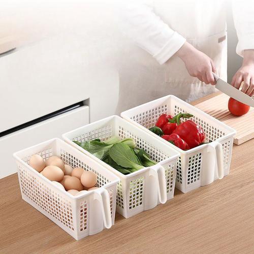 Plastic storage basket - Plastic storage basket Equipped with front wheels that make it easier to transport and use, and a rear handle. 
 Reticular design for ventilation when storing food. 
 Versatile in kitchen, bathroom, office and room. 
 Made of PP materials 
 Size: Length 30 cm ✖️ Width 15.5 cm ✖️ Height 14 cm.