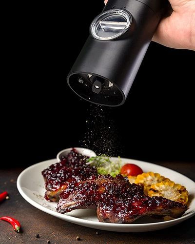 Electric Pepper Grinder - The Electric Salt and Pepper Grinder is made of high-quality materials, and the modern and stylish design is the perfect addition to any kitchen. One-hand operation with a small lamp. One-handed use  The LED light will automatically turn on when the grinder is in operation, the light shines clearly, helping to prevent food from over-seasoning.  The salt mill can be used for all kinds of spices, such as pepper, sea salt, cumin, and so on. Simply add your favorite herbs or spices, then grind, following the operating instructions. Openable front silo cover design, convenient. Unlimited gears to adjust the thickness, grinding in a second.  Immediately after grinding, the amount of pouring is clearly visible. 4 AAA batteries, more energy efficient and environmentally friendly. 4 AAA batteries are required (no batteries included).