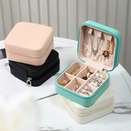 Portable mini jewelry storage box - This double-tier jewelry organizer features a compact, carry-on-the-go shape, making it easy to store jewelry while traveling. It has a zip closure, lightweight and portable. It can store precious souvenirs such as earrings, bracelets, necklaces, rings, pendants and cufflinks for women or girls. Other accessories can be stored in the network or separated. It has 3 necklace hooks, 6 rings storage slots, 4 ear studs storage, and the partition can be removed to store lipsticks etc. The inside of the jewelry box is made of ultra-soft flannel material to prevent damage to the jewelry in the storage process. Made of PU leather, it is wear-resistant, stain-resistant and not easy to peel off. The frame material is reinforced cardboard, which will not cause deformation of the jewelry box due to external extrusion. Dimensions: 3.93 in * 3.93 in * 1.96 in / 10 cm * 10 cm * 5 cm