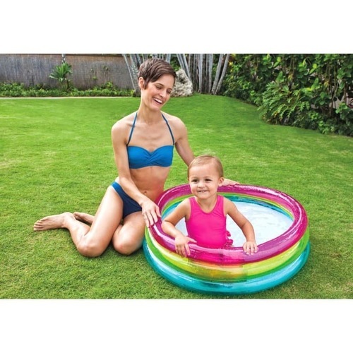 Intex Inflatable Pool for babies (86*25)cm - Small and fun swimming pool for children. The rainbow kids pool is specially designed for young children as kids love colors. very comfortable.  A special gift for your children during the summer.  Made of safe and comfortable materials for children. The pool has 3 different colors, and no bubble mat. Measures 86 x 25 cm Includes 3 inflatable rings Pink, Yellow, and Blue Color Water capacity 57 liters Suggested fill level 18 cm Age 1 - 3 years