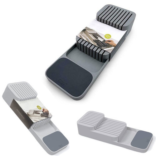 Knife’s organizer - Uniquely designed compartments for different knives create more space in your drawer, or out. 
  It's two levels 
    Upper level for small knives 
   Lower level for large knives 
    Stores up to 16 knives 
   Non-slip feet 
   Material: plastic 
  Easy to clean 
   Dimensions are 39.8cm x 5.3cm x 7.5cm