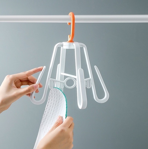 shoes hanger - The shoe rack is a foldable design, which can hang two pairs of shoes at the same time and is convenient to put away when not in use. The drying rack has four multifunctional clips, which can dry socks, insoles and shoelaces. The shoe rack has a 360° rotating hook design, which is wind-proof and more convenient. The hook rack is easy to hang on the closet, shower pole, laundry room, clothes line, etc. The multifunctional rotating rack is available in a variety of colors, which is not only functional and practical, but also brings color to your home. 


Material: ABS+PP. Color: white, green, blue. Size: 19.3x19.3x24cm.