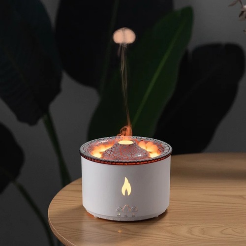 Volcano flame scent and air humidifier - Ultrasonic Aroma Diffuser Humidifier Volcano Shape 300 ml     2 Mist Modes - This flame diffuser ultrasonic flame humidifier adopted ultrasonic atomization, combined with smart LED lights to simulate flame and volcano mode, flame mode is like fog in the air, and volcano mode emits fog like a volcanic eruption scene   The elegant look is beautifully combined with the fog modes.   Large open water tank - 300ml large capacity, large diameter design, easy to add water and essential oils,   SAFE & AUTOMATIC OFF - The aromatherapy diffuser has two convenient auto-off timer settings: (2h/8h) and waterless automatic protection shutdown in any mode, safer when sleeping, and creates a relaxing atmosphere in the bedroom and office