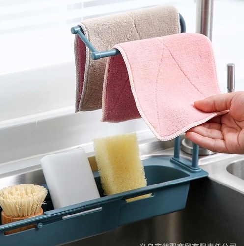 2 in 1 sink Organizer - Telescopic sink shelf New large-scale design: it can meet different needs, adapt to different basin sizes, adjust the length freely, and can be a large storage capacity.  PERFECT KITCHEN TOOL: Open and hollow design allows water to drain quickly, perfect for kitchen storage organizer of sponges, brushes, dish rags and kitchen utensils.  The sink stand will keep your utensils away from the dirty water in the pool and prevent bacteria growth.  2-IN-1TOWEL BAR: Daily design, can keep the fabric dry, breathable, clean and hygienic
 Customize:  Material: PP  Weight: about 260 grams  Product size: 39.5 * 27 * 8.5cm / 15.6 * 10.6 * 3.3in