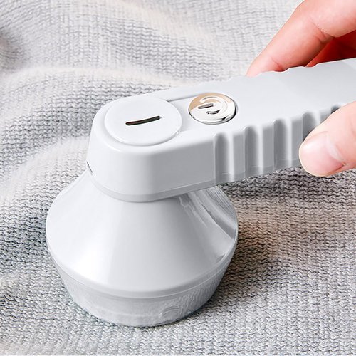 Electric lint remover - Rechargeable Electric Lint Remover with Triple Stainless Steel Blades, Removable Container, Easy to Remove Fuzz, Lint, Pills, Bubbles 
   Feature: 
   Material: ABS 
   Product size (L x W x H): 16 x 8.5 x 8 cm / 6.3 x 3.35 x 3.15 in 
   Packing size: 17 * 9 * 9cm / 6.69 * 3.54 * 3.54in 
   Net Weight：150g / 0.33lb 
   Gross weight: 200g / 0.44lb 
   Charging time: 2-3 hours 
   Use time: about 60 minutes 
   Description: Good housekeeping for most fabric can 
     Easily remove lint balls, pills and fuzz.  Custom designs on 3 sizes of eyelet holes are suitable for sweaters, blouses, blankets, bed sheets, sofa upholstery, curtains, fabrics, quilts and more;  Keep everything fresh 
   RECHARGEABLE, EASY TO USE, TRAVEL FRIENDLY - This cloth machine is designed with USB charging, making charging easy, direct plug into laptop/desktop, power bank, car charger, charger adapter.  No need to waste your money on batteries anymore.  Once fully charged it will work about 60 minutes.  Small and portable, suitable for travel and home use.  Durable Blades and Larger Container The high-strength stainless steel blade provides a long working time for years.  In addition, the large-capacity removable container is enough to clean the laundry in large quantities and it is also easy to empty. 
   MULTI-PURPOSE FOR ALL TYPES OF FABRICS - This shaver features 3 sharp stainless steel blades, easily removes loose threads, fuzz balls and lint from your winter coat, sweater, scarf, mittens, plush toys, car cushion, sofa, leggings, bedding, curtains, linens and other garments or fabrics that need  To remove the fluff!