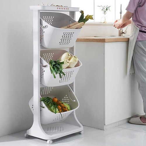 Multi-Tier Kitchen Basket (With Wheels) - Three-layer design, with extra storage for the top layer 
   Angled basket for easy access 
   360 degree spinner wheels for easy movement Instead
 of leaving fruits and veggies everywhere, place them in this Multi-tier
 Kitchen Basket instead! House them in its baskets, which are angled for
 convenient placing and retrieval. Its top layer is also perfect for 
condiment, sauce and other small item storage. Utilise height to get on 
top of that kitchen clutter today!