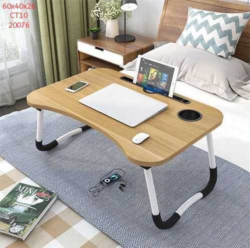 Classic Foldable Table - Multi-use desk: not only work as a laptop desk, but also as a TV 
Dinner Tray, serving desk for patients/kids, Standing Desk for office 
workers, Book Tray of readers, Writing Desk for kids, Tablet Holder, 
Standing Desk/Stand Up Desk    
 100% Environmental. We 
adopt 100% Engineered Wood and made it with our exquisite craftsmanship,
 providing you smooth surface desk. 
 Portable Desk. 
Simple design and green material to make your life more fashion. 
Reaching the highest quality standard (Perfect fit for 15.6 or even for 
17 inch in laptop) Suitable from 5-year-old child to 80-year-old 
senior. A smooth surface bamboo laptop desk can use for surfing the 
Net,reading book, painting work, enjoy leisure snack time, serving 
breakfast, enjoy family time......on your bed, sofa, couch, floor, lawn 
etc./ indoor or outdoor  
 Features & details • Durable and Sturdy structure: Made of powder-coated metal tubes and high quality Engineered Wood top board. This Lap Table have good compression resistance •
 Versatile and space-saving:Ideal for using while eating food doing 
homework or surfing the internet on the sofa bed, the floor or recliner. • Foldable and Portable PC Table:Overall dimension: L 60CM H 28 CM W 40 CM. Lightweight portable and eary to carry. •
 Using it for simple dining table laptop computer table studying desk 
serving table or any other scenes you want for reading writing drawing 
board games models puzzles arts and crafts trade shows gardening. 
 • Thoughtful design and nice craftmanship:The powder-coated metal legs are foldable to make daily storage easier