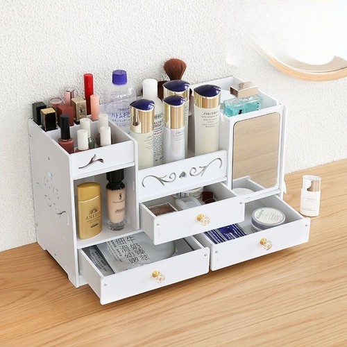 Cosmetic organizer 3 drawers - Jewelry and cosmetics organizer with 3 drawers and a mirror. 
  
 With staircase design.  Save space for your desktop.  Keep your 
cosmetics neat and organized.  Convenient to get what you want. 
  Adjustable mirror to suit your need 
   Perfect for storing jewelry, stationery, cosmetics and other small items, etc. 
   Save a lot of space, making your desk more tidy and organized and making your life more fun. 
 
 
  Simple Assembly: With assembly tools and instructions, assembly can be completed in a few seconds! 
   Made of high quality wood material, with fine and smooth workmanship, sturdy and durable. 
 
   Customize: 
   Material: PVC wood-plastic board (WPC wood/plastic composite) 
   Frame colour: white 
  Size: height * width * depth 
  26cm*45cm*19cm