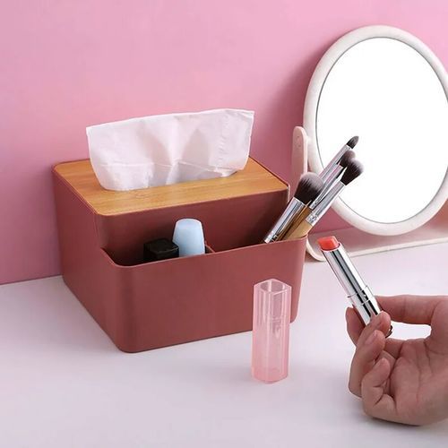 Tissue box with two storage slots