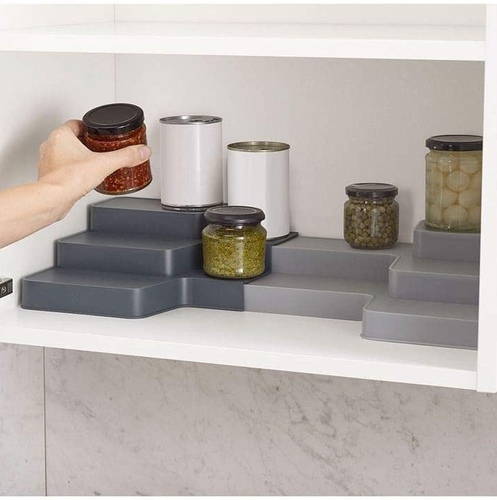 extendable cupboard orgnaizer - 3-Tiered design improves organization, visibility, and access in cabinetsShelf organizer can go from 16.5 inches to 24.5 inches wideEasy to fit and adjustSuitable for kitchen shelves over 10.25 inches deepDimensions: compact 3.63 H x 16.5 W x 10.25 D inches; fully expanded 3.63 H x 24.5 W x 10.25 D inches