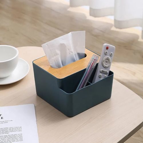 Tissue box with two storage slots