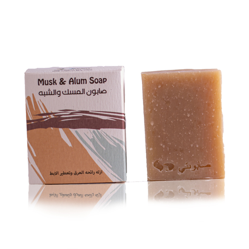 Sabonaty - Shabah musk /  musk & alum soap - Natural soap from coconut oil ,,, thanks to the original aromatic smell of white musk and with the presence of a powder similar to musk soap works like a likeness to remove the smell of sweat 
 Benefits of alum soap:
 Used to lighten dark spots, it helps get rid of skin coloring caused by contact with the skin when friction and sweating.
 It is rich in foam and soft on the skin.
 Does not cause allergies or side effects.
 Natural soap for personal hygiene is ideal for all skin types.
 Used as a natural treatment for oily skin and acne
 Weight: 100 g
 
 _________________________________________________________________________ 
 Alum is a disinfectant stone containing mineral salts, originally used by ancient Egyptians, more than 4,000 years ago for its therapeutic and disinfectant properties, which stops bleeding small wounds, shrinks blood vessels and tightens pores, acts as an antiperspirant, is used to treat pimples and wrinkles, remove hair, and is used as a mouthwash. Alum is a crystal-like stone, used by men after shaving, to combat a number of skin problems, including shaving bumps and redness, that can help stop bleeding from small wounds, containing disinfectant properties that kill surface bacteria
 Alum can be used as an anti-sweat, for centuries, alum has been used in the ventricle area, because it provides excellent protection for smell and sweat, and there is an additional benefit that it is 100 natural