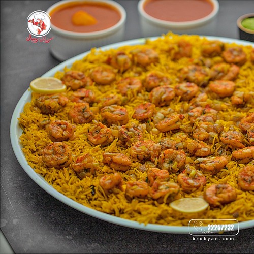 Shrimp Rice for 5 Persons - Shrimp rice tray, achar, green
and red maboj, and broth.