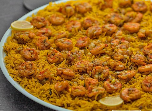 Umm Al 3ish - Shrimp Rice for 5 Persons - Shrimp
rice tray, achar, green and red maboj, and broth.