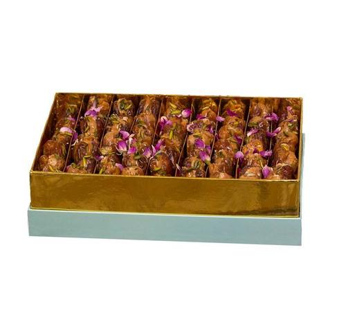 SPECIAL DATE  BOX - DATES WITH MIX NUTS AND CREAMY SAUCE. 
 YOU CAN CHOOSE YOUR FLAVOURS PLEASE CONTACT 64444273.  45 PIECES.