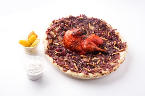 Chicken Musakhan - Traditional Palestinian dish featuring tender chicken cocked with sumac and caramelized onions