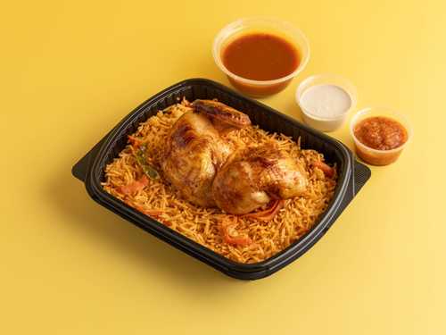 Half Grilled Chicken With Boukhari Rice - Half a grilled chicken meal with Bukhari rice, Yemeni daqoos, daqoos, arugula, and onions