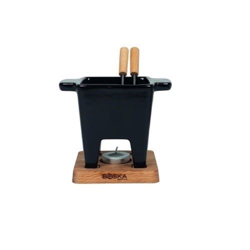 BOSKA Tapas Small Fondue Set, Black - The BOKSA Tapas Fondue is the perfect companion for a cozy night in or a fun gathering. This compact set lets you enjoy a solo cheese fondue meal or a romantic dinner for two. It's also ideal for keeping dips like satay or mushroom sauce warm during barbecues or get-togethers. Simply dip your favorite meats or veggies with two included fondue forks into the melted cheese kept warm by the tea light for hours. Has a capacity of 300 ml, large enough for around 175 gr of fondue cheese or 200 ml of warm sauce. Fondue pot made of ceramic. Base made of high-quality European oak. The stainless steel fondue forks have beautiful oak handles. Fondue pot can only be used in the microwave. Set Contains:1x Fondue pot 1x Oak base 2x Fondue forks