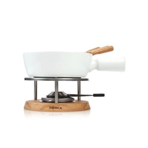 BOSKA Large Fondue Set Bianco - The BOSKA Fondue Set Bianco is the perfect way to surprise family and friends with a delightful cheese fondue dinner. Perfect for a cozy gathering with up to four people, this set also doubles as a versatile appetizer serving dish for any occasion. Simply slice up a baguette and dip away into the deliciously melted cheese, kept warm for hours by the burner. The white fondue pot has a capacity of 1.3 L, making it large enough for 875 gr of fondue cheese. The fondue pot is made of ceramic, and can only be used on a gas stove. The base contains both European oak and stainless steel. The stainless steel fondue forks have beautiful oak handles. Set Contains:1x Fondue pot 1x Oak base 4x Fondue forks 1x Burner