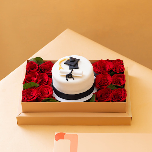 The graduate - Box contains graduation cake with red roses