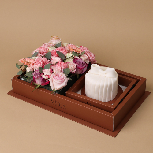 Sornto - This box contains a chocolate cake and&nbsp; with an arrangement of roses, gerberas, and carnations.