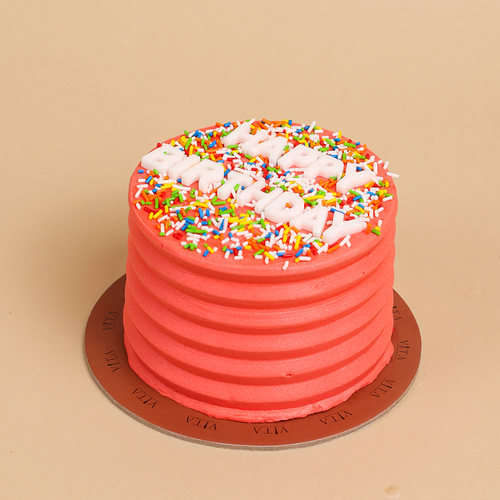 Banu - A box that contains a pink cake.