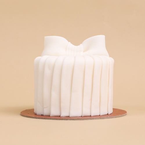 Positive - A box that contains a white cake.