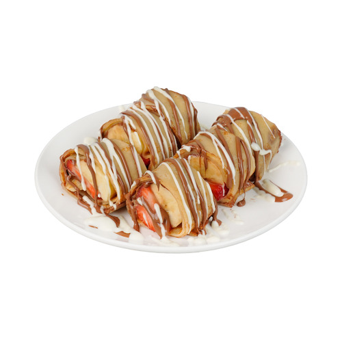 Fruity Sushi Crepe - French pancake made with a thin batter filled with Nutella spread with banana and strawberry rolled and sliced into sushi type garnished with milk chocolate with on the side dip.