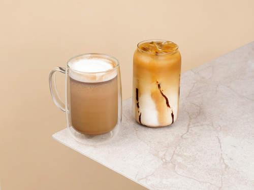 Mocha - 2 Shots of espresso with dark chocolate sauce and steamed fresh milk.