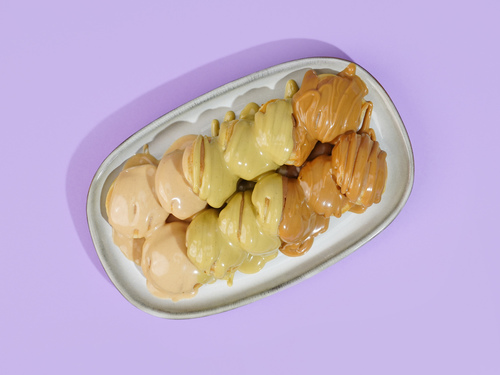 Mini Pancke Mix without Toppings - 12 Circular pieces of our signature pancake batter drizzled topped with 3 sauces of pistachio, lotus and kinder.