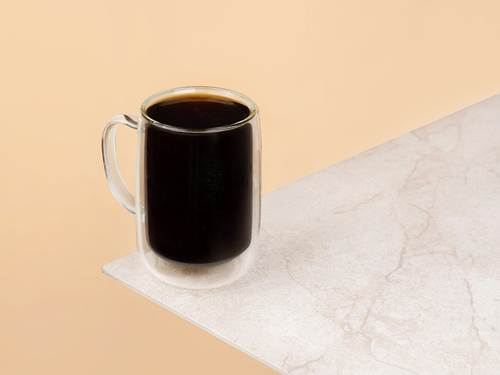 Americano - A freshly brewed of 2 shots espresso diluted with hot water.