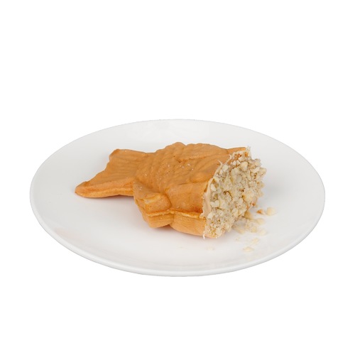 Taiyaki Waffle - Kinder - made on-site in a sizable spinning fish shaped mold filled with kinder spread topped with ground hazelnuts.