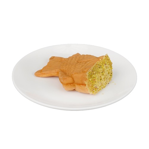 Taiyaki Waffle - Pistachio - made on-site in a sizable spinning fish shaped mold filled with pistachio spread topped with ground pistachio nuts.