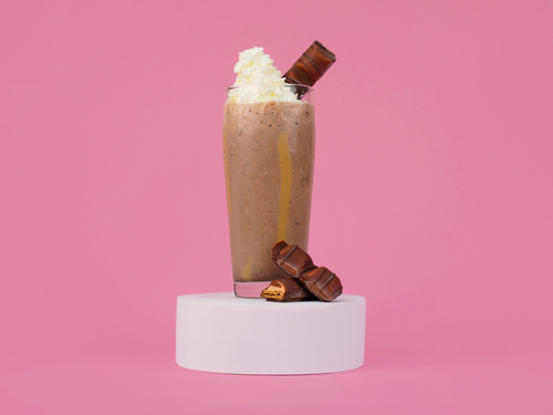 Kinder Milkshake - A blended vanilla ice cream with kinder sauce and kinder bar topped with whipping cream
