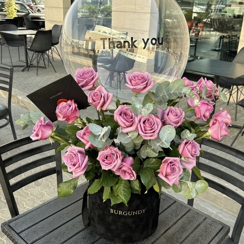 BGE BUBBLE - It contains 25-30 roses with a bubble balloon.